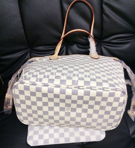 how to spot fake louis vuitton neverfull damier ebene|louis vuitton neverfull authentic.